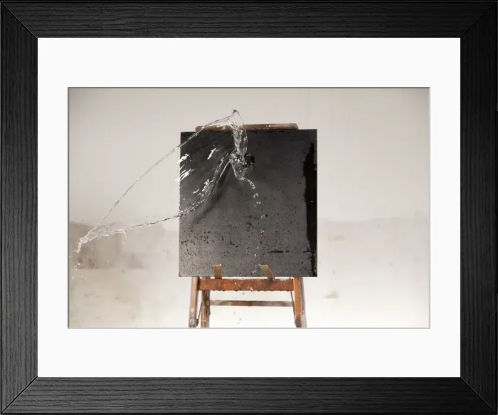 Framed Print : Water being splashed on a blackboard Framed Print : Water being splashed on a blackboard