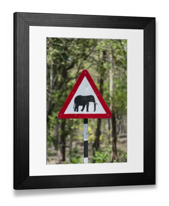 Framed Print : Traffic signs, warning of crossing elephants, Nagarhole National Park, Karnataka, India Framed Print : Traffic signs, warning of crossing elephants, Nagarhole National Park, Karnataka, India