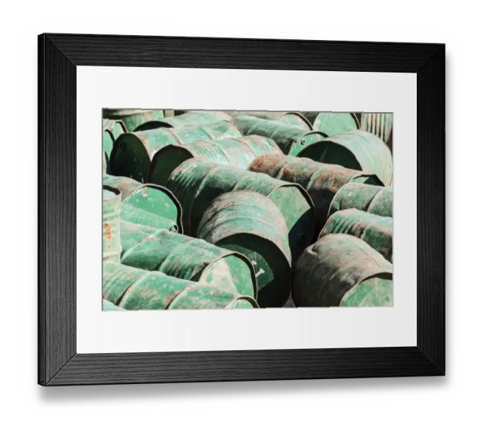 Framed Print : Green metal barrels