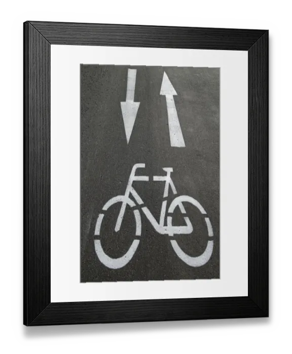 Framed Print : Cycle path, directional arrows, road markings on the asphalt Framed Print : Cycle path, directional arrows, road markings on the asphalt