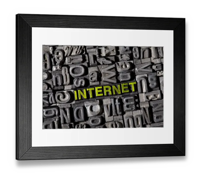 Framed Print : Old lead letters spelling the word INTERNET Framed Print : Old lead letters spelling the word INTERNET