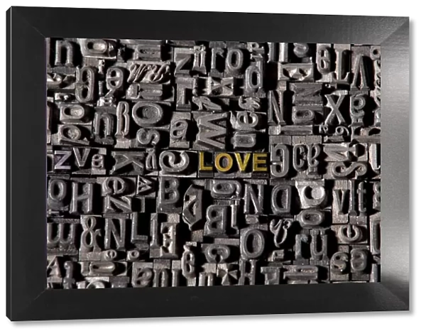 Old lead type forming the words love