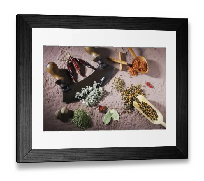 Framed Print : Various spices with a mincing knife on a sandstone base Framed Print : Various spices with a mincing knife on a sandstone base