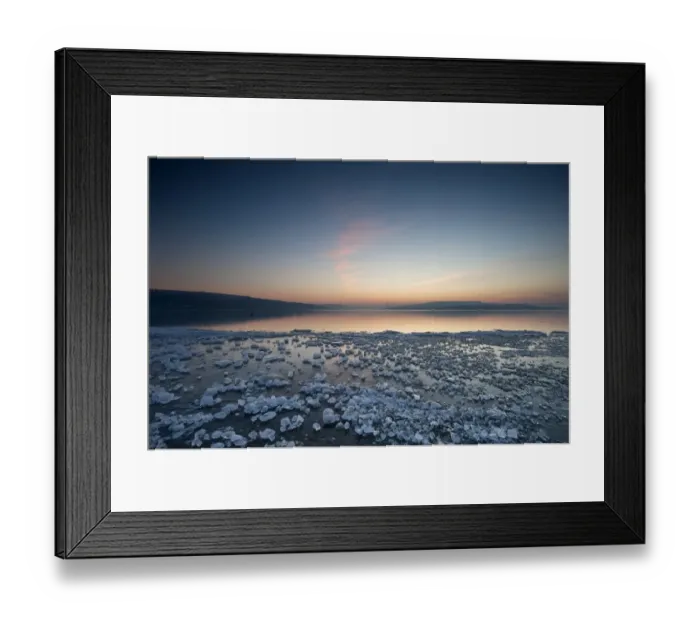 Framed Print : Chunks of ice lying on icy surface on the shore of Reichenau Island after sunset, Baden-Wuerttemberg, Germany, Europe Framed Print : Chunks of ice lying on icy surface on the shore of Reichenau Island after sunset, Baden-Wuerttemberg, Germany, Europe
