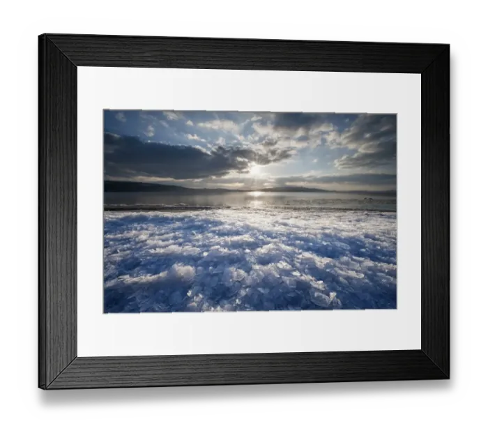 Framed Print : Sunlight with moody clouds, stacked ice floes on the shore of Reichenau Island, Baden-Wuerttemberg, Germany, Europe Framed Print : Sunlight with moody clouds, stacked ice floes on the shore of Reichenau Island, Baden-Wuerttemberg, Germany, Europe
