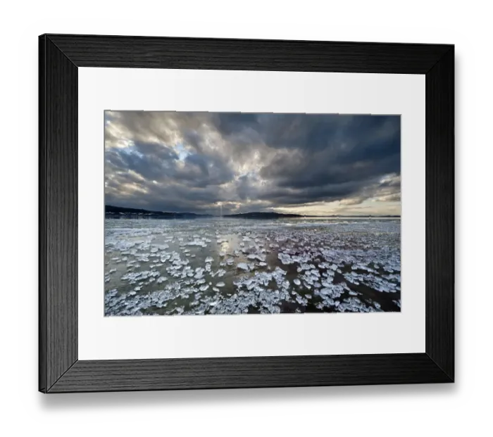 Framed Print : Chunks of ice lying on icy surface on the shore of Reichenau Island, Baden-Wuerttemberg, Germany, Europe Framed Print : Chunks of ice lying on icy surface on the shore of Reichenau Island, Baden-Wuerttemberg, Germany, Europe