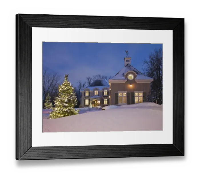 Framed Print : Luxurious residential cottage style home with illuminated evergreen trees at dusk in winter, Quebec, Canada Framed Print : Luxurious residential cottage style home with illuminated evergreen trees at dusk in winter, Quebec, Canada