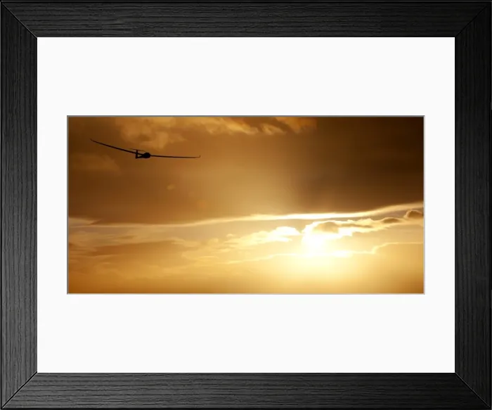 Framed Print : Glider at sunset