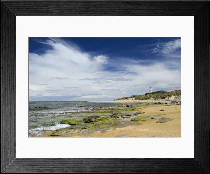 Framed Print : Lighthouse at Waipapa Point with clouds in the sky, sandy beach with algae covered rocks at the front, Otara, Fortrose, Southland Region, South Island, New Zealand Framed Print : Lighthouse at Waipapa Point with clouds in the sky, sandy beach with algae covered rocks at the front, Otara, Fortrose, Southland Region, South Island, New Zealand