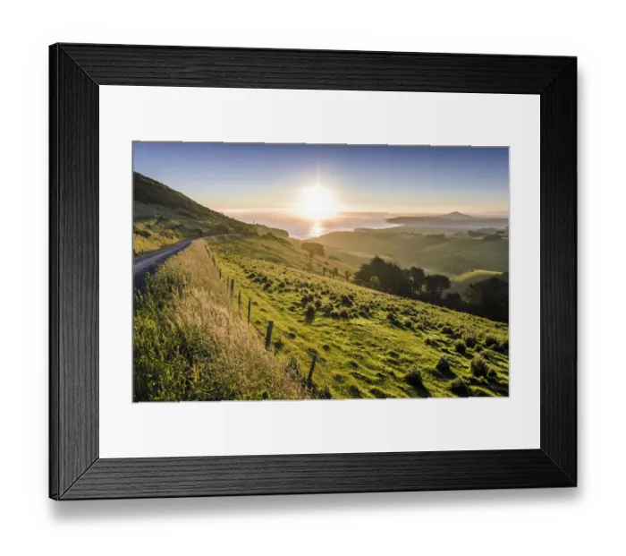 Framed Print : Sunset over grassland and a country road, Dunedin Beach at the back, Otago Peninsula, South Island, New Zealand, Oceania Framed Print : Sunset over grassland and a country road, Dunedin Beach at the back, Otago Peninsula, South Island, New Zealand, Oceania