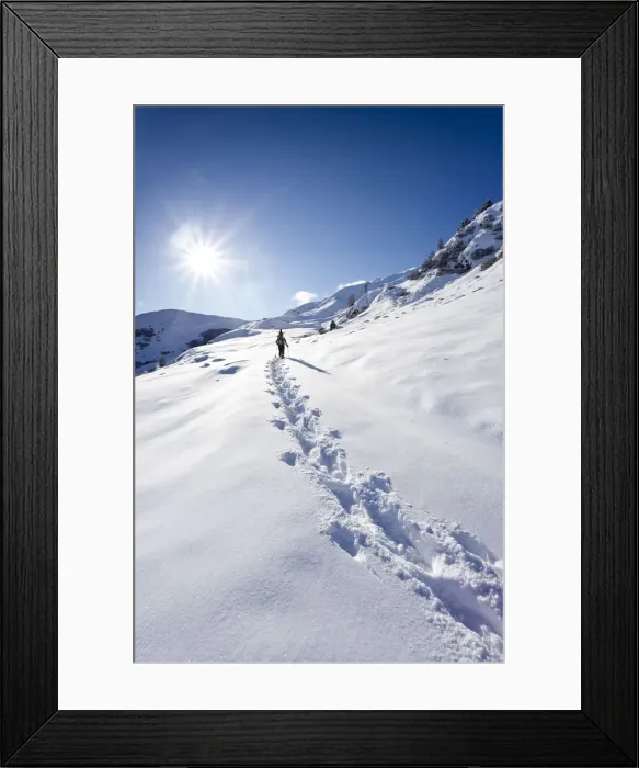 Framed Print : Snowshoer ascending to Jagelealm alpine pasture in Ridnauntal Valley above Entholz, Alto Adige, Italy, Europe