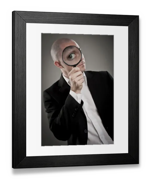 Framed Print : Businessman with magnifying glass Framed Print : Businessman with magnifying glass