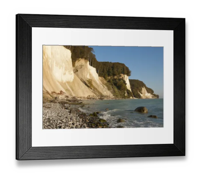 Framed Print : Stone beach, chalk cliffs and a beech forest, Jasmund National Park, Ruegen, Mecklenburg-Western Pomerania, Germany Framed Print : Stone beach, chalk cliffs and a beech forest, Jasmund National Park, Ruegen, Mecklenburg-Western Pomerania, Germany