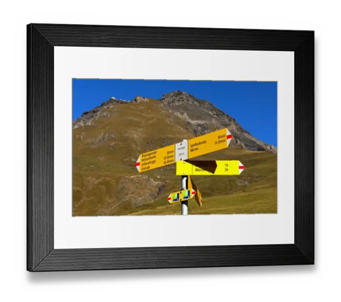 Framed Print : Yellow hiking signposts on an alpine pasture below Schilthorn Mountain in the Muerren hiking area, Bernese Oberland, Switzerland, Europe Framed Print : Yellow hiking signposts on an alpine pasture below Schilthorn Mountain in the Muerren hiking area, Bernese Oberland, Switzerland, Europe