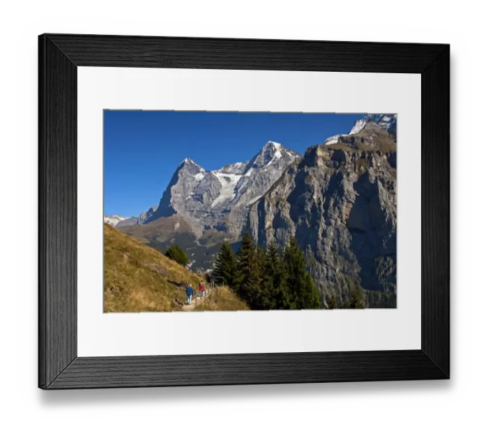 Framed Print : Hikers at the foot of Eiger and Moench Mountains and Eiger glacier, Murren, Bernese Oberland, Canton of Bern, Switzerland Framed Print : Hikers at the foot of Eiger and Moench Mountains and Eiger glacier, Murren, Bernese Oberland, Canton of Bern, Switzerland
