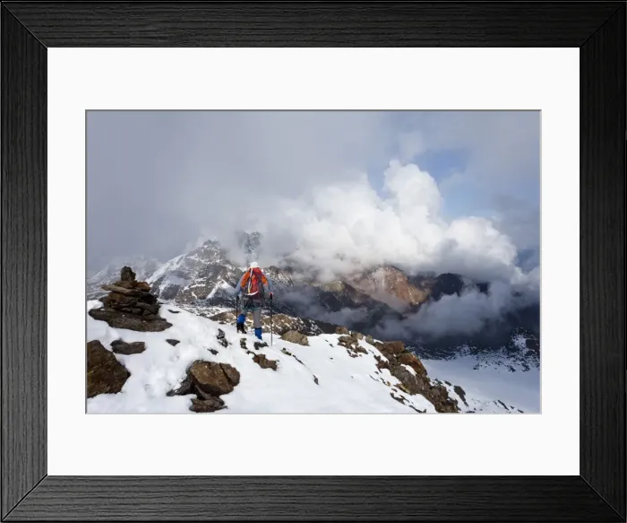 Framed Print : Hiker on Lorcherspitz Mountain, looking towards Weissenbrunnspitz Mountain and Zufrittspitz Mountain in heavy fog, Alto Adige, Italy, Europe