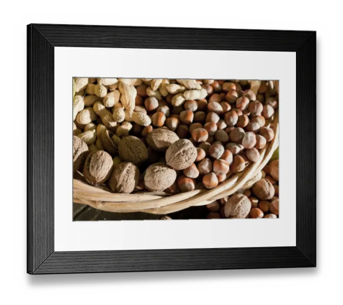 Framed Print : Wicker basket with mixed nuts, Walnuts -Juglans regia-, Peanuts -Arachis hypogaea- and Hazelnuts -Corylus avellana- Framed Print : Wicker basket with mixed nuts, Walnuts -Juglans regia-, Peanuts -Arachis hypogaea- and Hazelnuts -Corylus avellana-