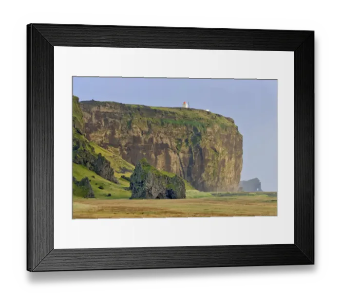 Framed Print : Tuff rock with a lighthouse, Dyrholaey, Vik i Myrdal, Southern Region, Iceland