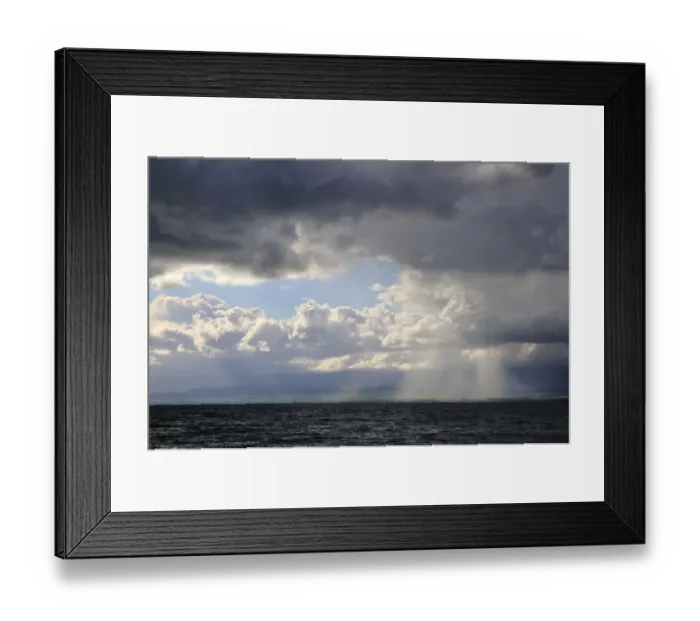 Framed Print : Storm clouds and sunbeams above Lake Geneva, Lac Leman, Evian-les-Bains, Haute-Savoie, Rhone-Alpes, France Framed Print : Storm clouds and sunbeams above Lake Geneva, Lac Leman, Evian-les-Bains, Haute-Savoie, Rhone-Alpes, France