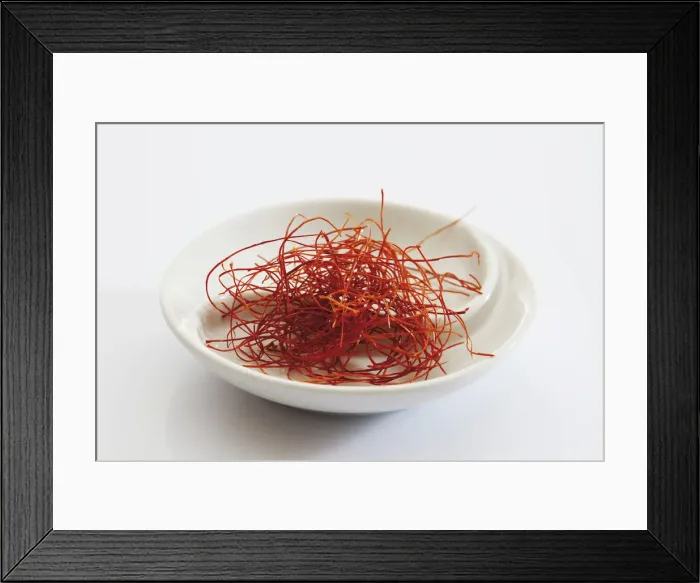 Framed Print : Red chilli threads in a small porcelain bowl Framed Print : Red chilli threads in a small porcelain bowl