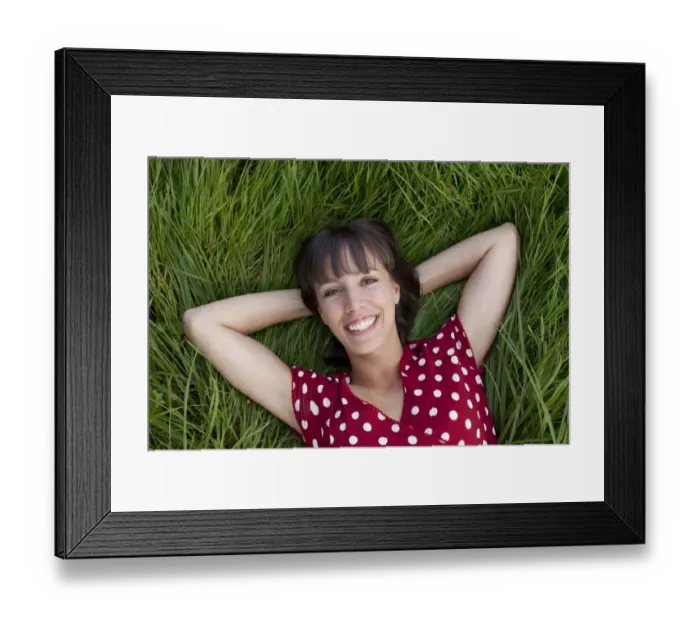 Framed Print : Young woman, 25, lying in a meadow Framed Print : Young woman, 25, lying in a meadow
