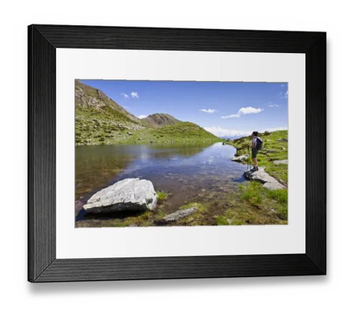 Framed Print : Hiker at the lake below the summit of Mt Hochwart or Guardia Alta, climbing Mt Ultner Hochwart or Vedetta Alta in Ulten Valley or Val dUltimo, Mt Kornigl in the back, Ulten, South Tyrol, Europe Framed Print : Hiker at the lake below the summit of Mt Hochwart or Guardia Alta, climbing Mt Ultner Hochwart or Vedetta Alta in Ulten Valley or Val dUltimo, Mt Kornigl in the back, Ulten, South Tyrol, Europe