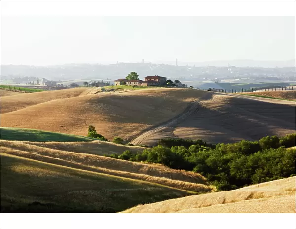 Farmhouse on a hill, typical Tuscan landscape near Ville de Corsano, Tuscany, Italy, Europe