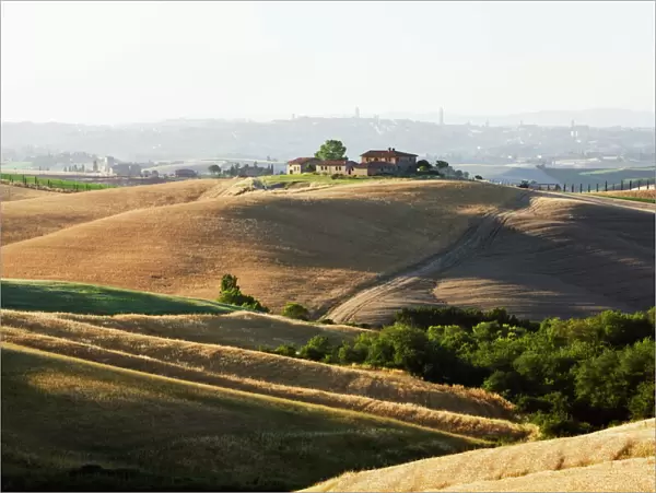 Farmhouse on a hill, typical Tuscan landscape near Ville de Corsano, Tuscany, Italy, Europe