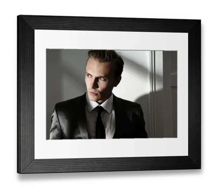 Framed Print : Fashion image, young man wearing a suit Framed Print : Fashion image, young man wearing a suit