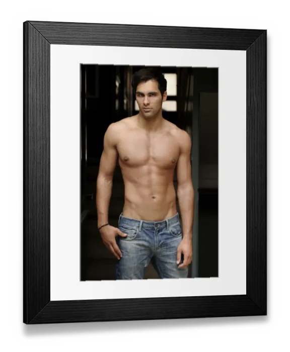 Framed Print : 21-year-old mediterranean-looking man, wearing jeans, bare upper body, in corridor Framed Print : 21-year-old mediterranean-looking man, wearing jeans, bare upper body, in corridor