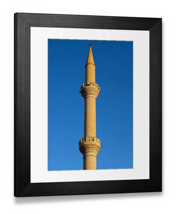 Framed Print : Minaret of a mosque protruding into the blue sky, Goreme, Cappadocia, Turkey Framed Print : Minaret of a mosque protruding into the blue sky, Goreme, Cappadocia, Turkey