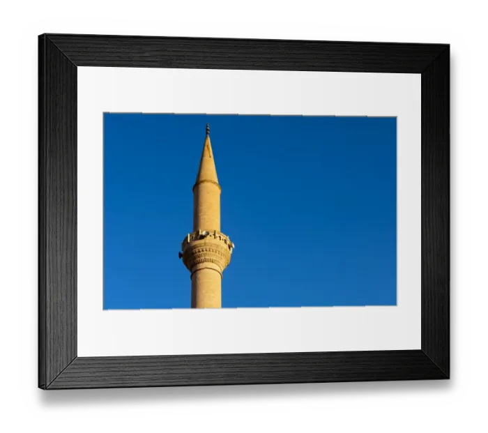 Framed Print : Minaret of a mosque protruding into the blue sky, Goreme, Cappadocia, Turkey Framed Print : Minaret of a mosque protruding into the blue sky, Goreme, Cappadocia, Turkey