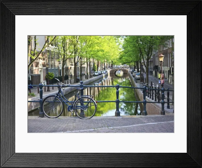 Framed Print : Bicycle on a bridge crossing a canal in the historic city centre of Amsterdam, Holland, Netherlands, Europe Framed Print : Bicycle on a bridge crossing a canal in the historic city centre of Amsterdam, Holland, Netherlands, Europe