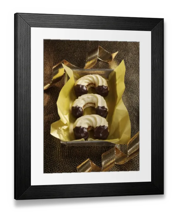 Framed Print : Piped biscuits in packaging Framed Print : Piped biscuits in packaging