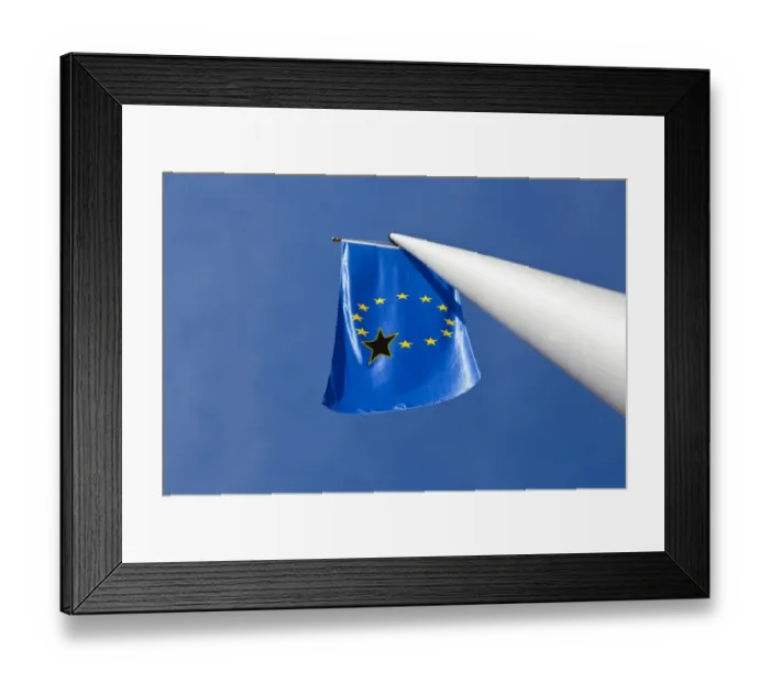 Framed Print : Low angle view of a European Union flag with one black star on it Framed Print : Low angle view of a European Union flag with one black star on it