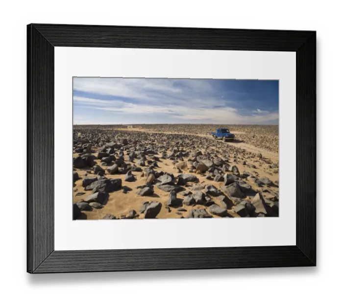 Framed Print : Car track in stone desert, Akakus Mountains, Libya, Sahara, North Africa Framed Print : Car track in stone desert, Akakus Mountains, Libya, Sahara, North Africa