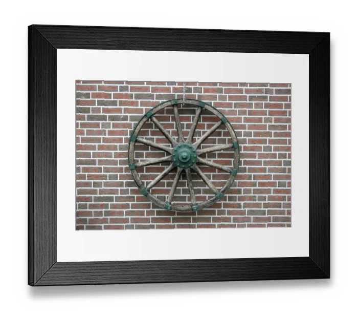 Framed Print : Cart wheel on a clinker brick facade in East Friesland, Lower Saxony, Germany, Europe Framed Print : Cart wheel on a clinker brick facade in East Friesland, Lower Saxony, Germany, Europe
