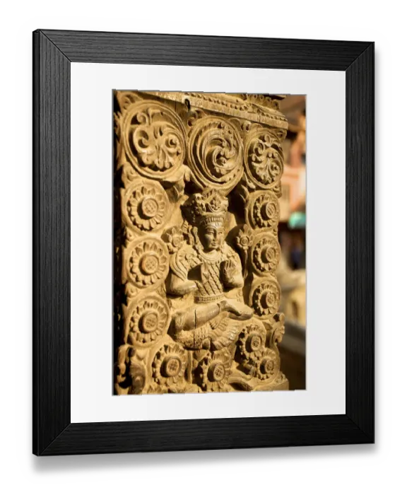 Framed Print : Woodcarving with god Shiva on the buttress of a house, Bhaktapur, Nepal, Asia Framed Print : Woodcarving with god Shiva on the buttress of a house, Bhaktapur, Nepal, Asia