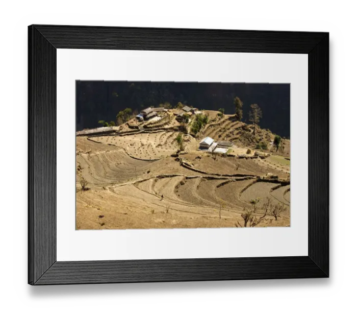 Framed Print : Cultivated landscape with a small village, rice fields layed out as terraces at the edge of an abyss, Annapurna Conservation Area, Nepal, Asia