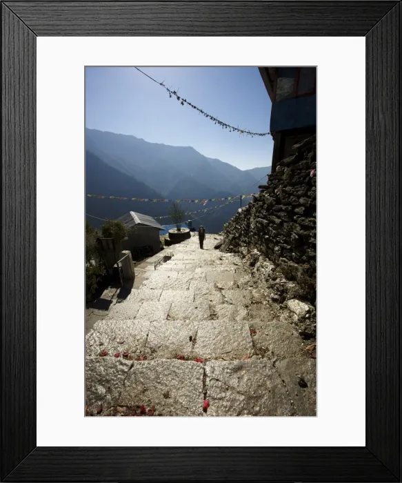 Framed Print : Hiker climbing shiny stone steps against a blue sky, Annapurna Conservation Area, Nepal, Asia Framed Print : Hiker climbing shiny stone steps against a blue sky, Annapurna Conservation Area, Nepal, Asia