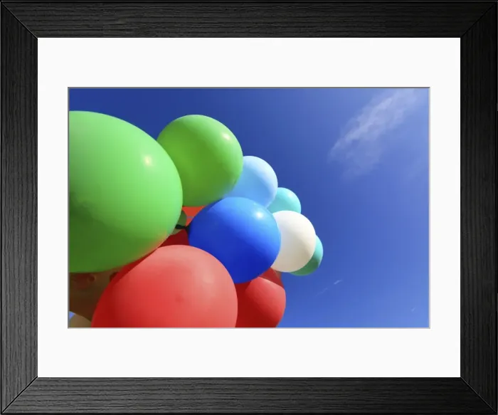 Framed Print : Many colourful balloons against a blue sky Framed Print : Many colourful balloons against a blue sky