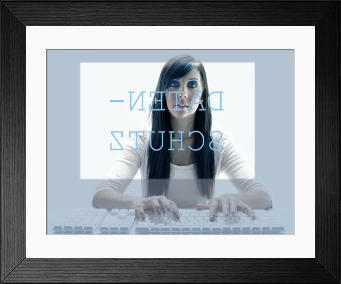 Framed Print : Young woman seen through the display of a computer while using the keyboard Framed Print : Young woman seen through the display of a computer while using the keyboard