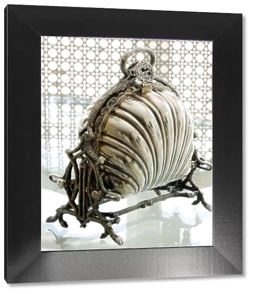 Antique silver hinged bread basket in a sophisticated atmosphere