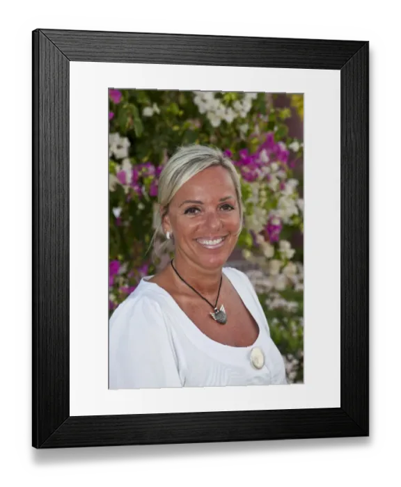 Framed Print : Portrait of a forty-year-old woman in front of flowers Framed Print : Portrait of a forty-year-old woman in front of flowers