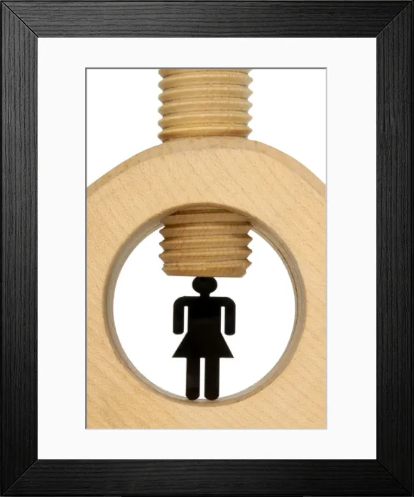 Framed Print : Black figure of a female in a clamp, pressure to perform Framed Print : Black figure of a female in a clamp, pressure to perform