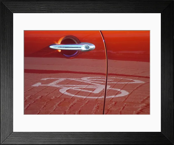 Framed Print : Red car door reflecting a pictogram from a bicycle lane Framed Print : Red car door reflecting a pictogram from a bicycle lane