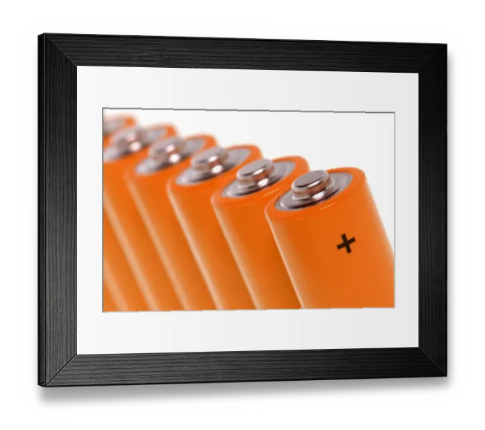 Framed Print : Row of orange batteries Framed Print : Row of orange batteries
