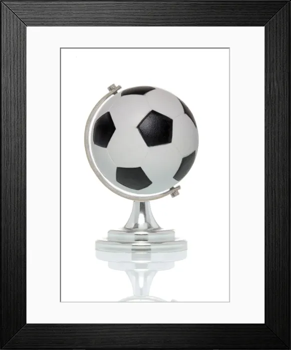 Framed Print : Football globe, symbolic image for international soccer Framed Print : Football globe, symbolic image for international soccer