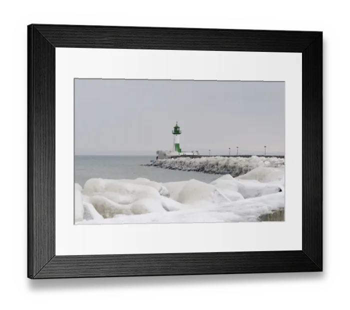 Framed Print : Iced wharf and a lighthouse in the port of Sassnitz on Ruegen Island, Mecklenburg-Western Pomerania, Germany, Europe Framed Print : Iced wharf and a lighthouse in the port of Sassnitz on Ruegen Island, Mecklenburg-Western Pomerania, Germany, Europe