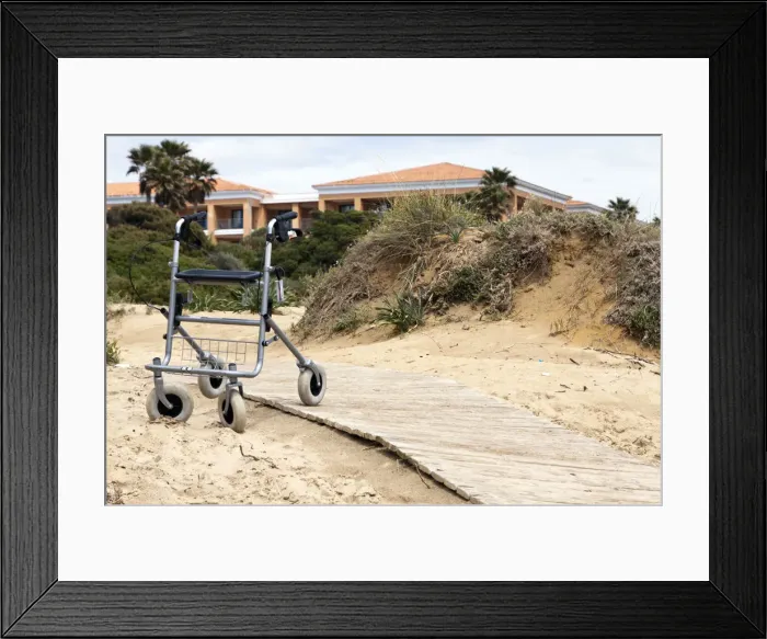 Framed Print : Walking frame left on the beach